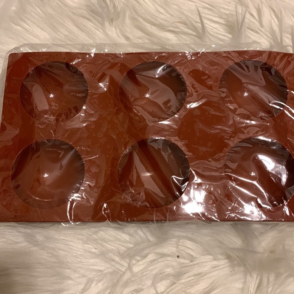 Set of three silicone six hole molds for baking.